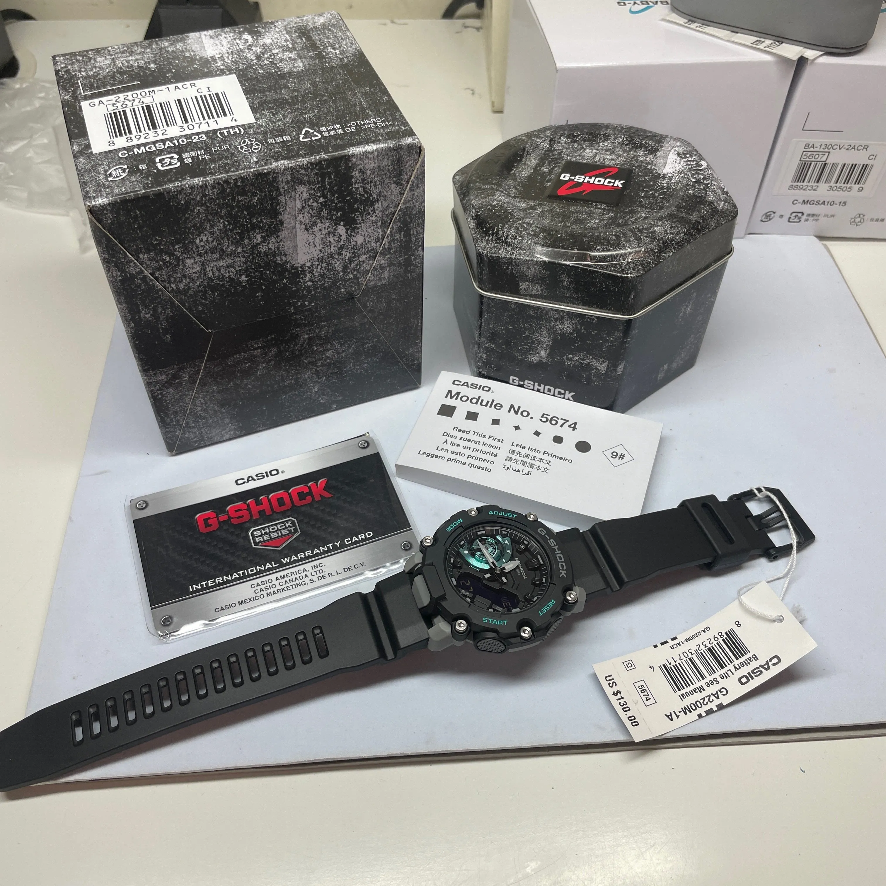 CASIO G-Shock GA2200M-1A Carbon Core Watch Blue Grey