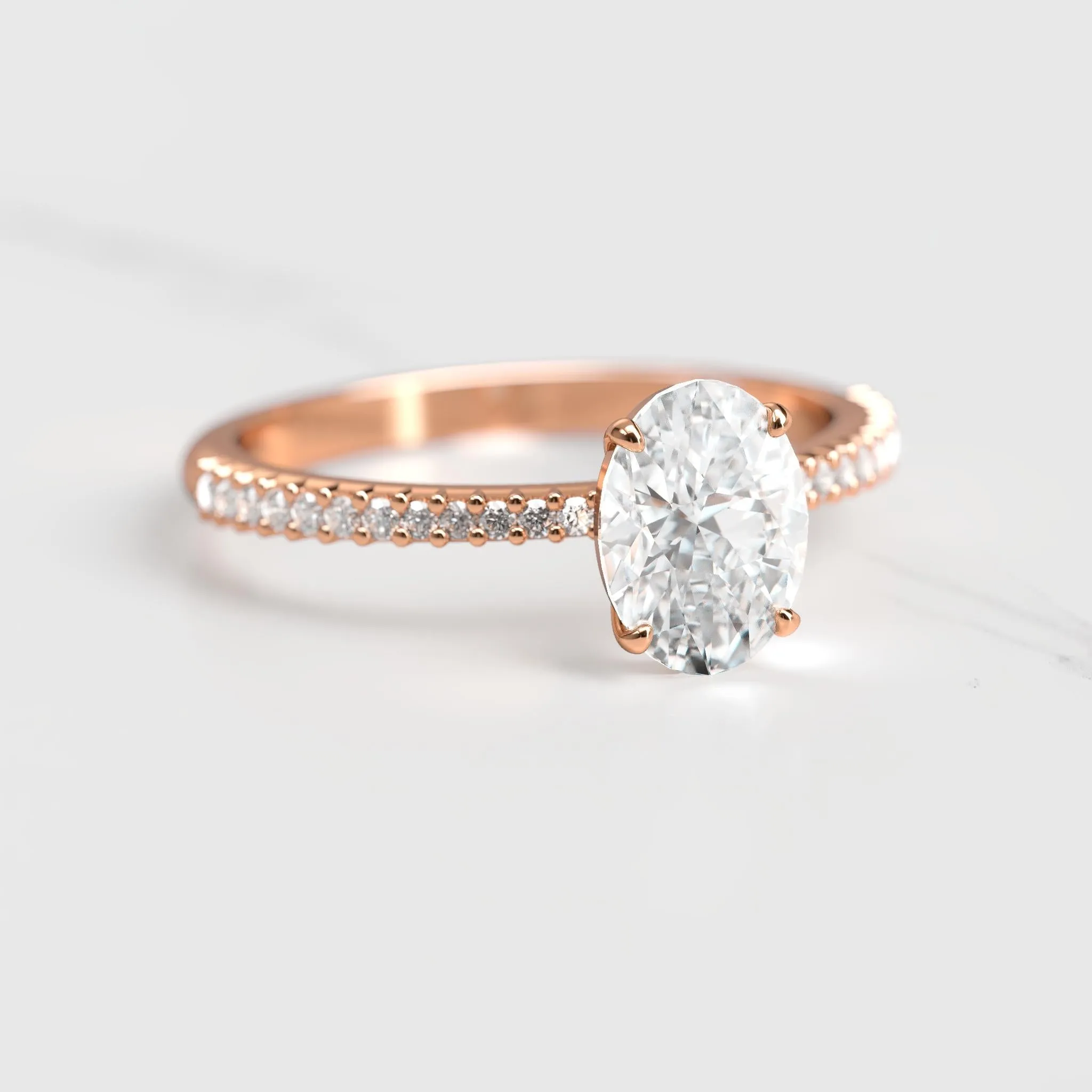 Oval Half Pave Tapered Diamond Ring