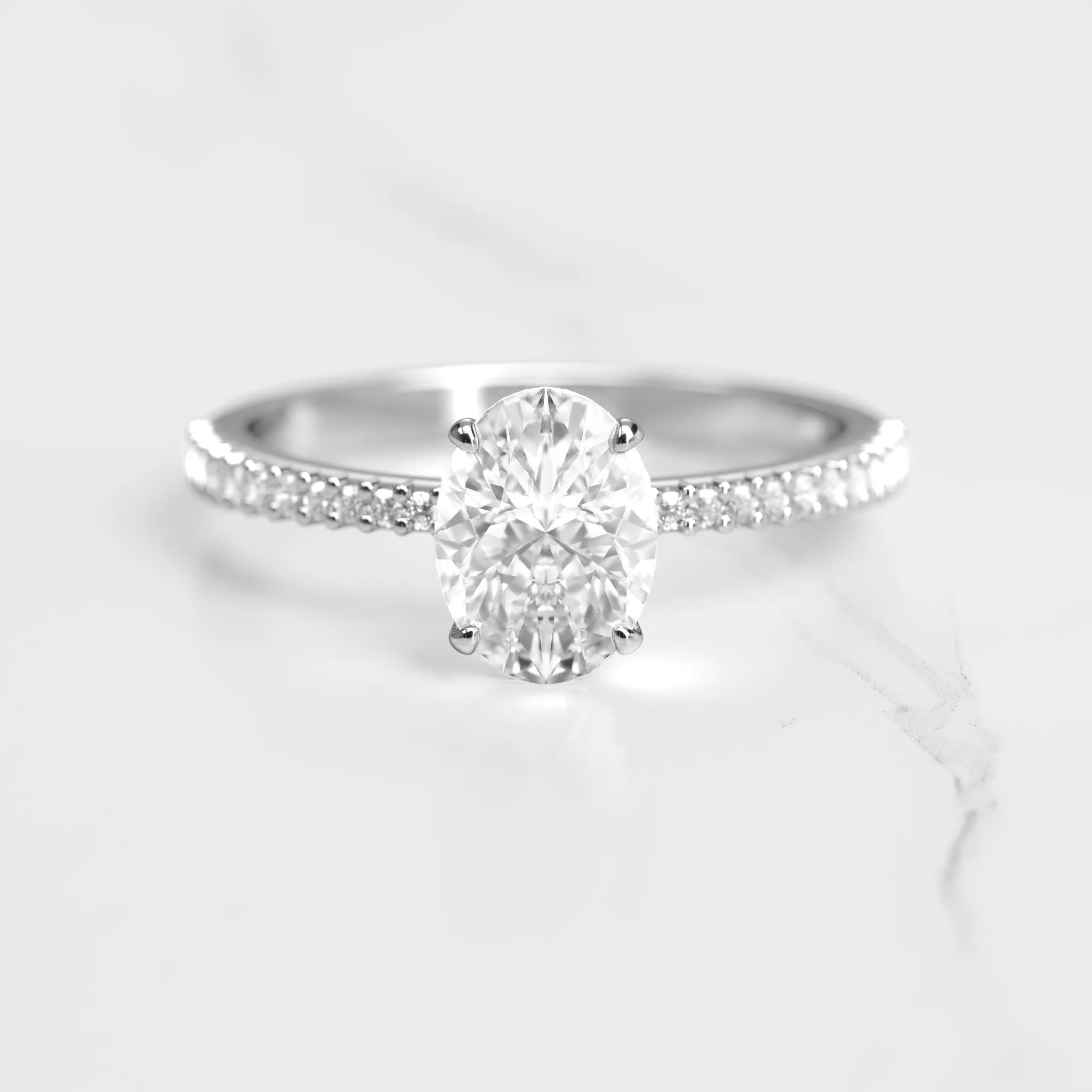 Oval Half Pave Tapered Diamond Ring