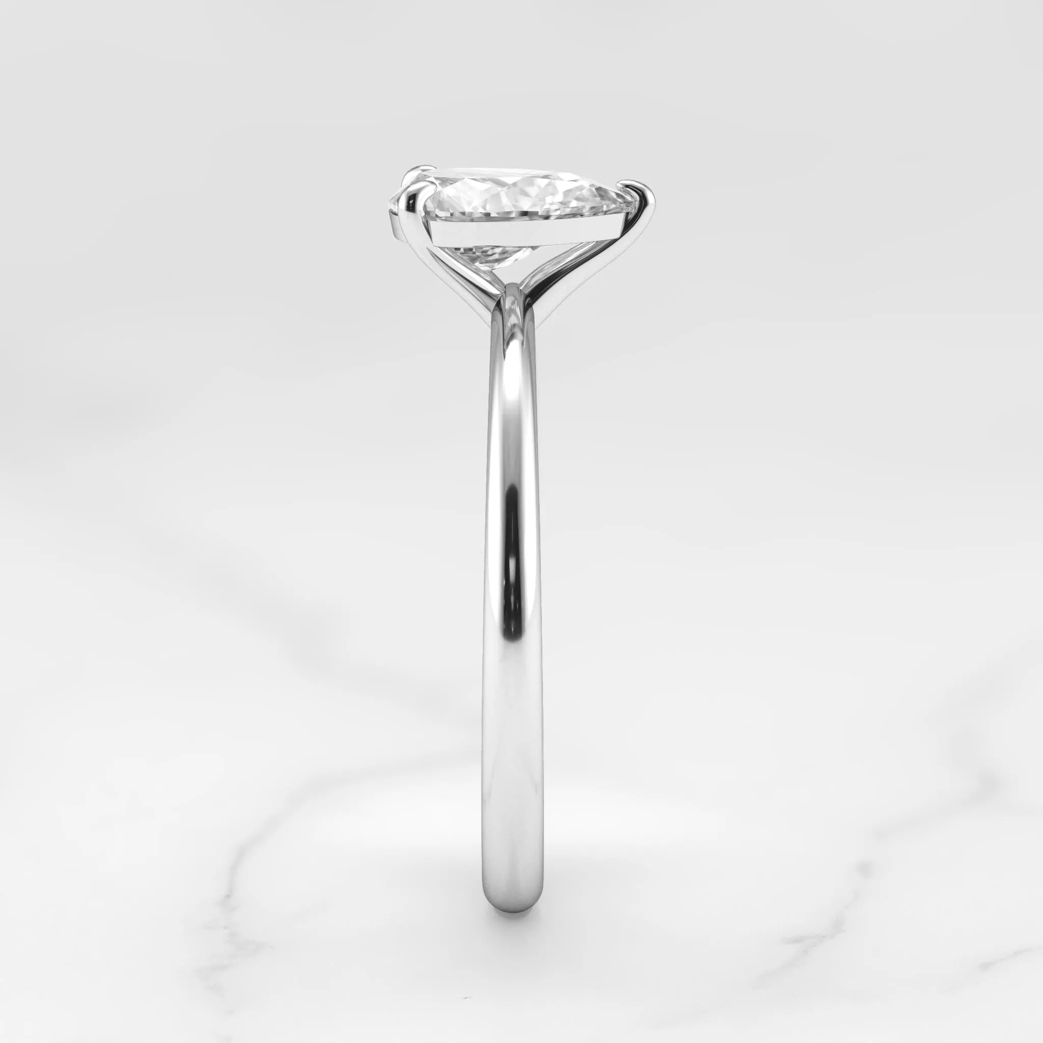 Pear Tapered Solitaire Diamond Ring