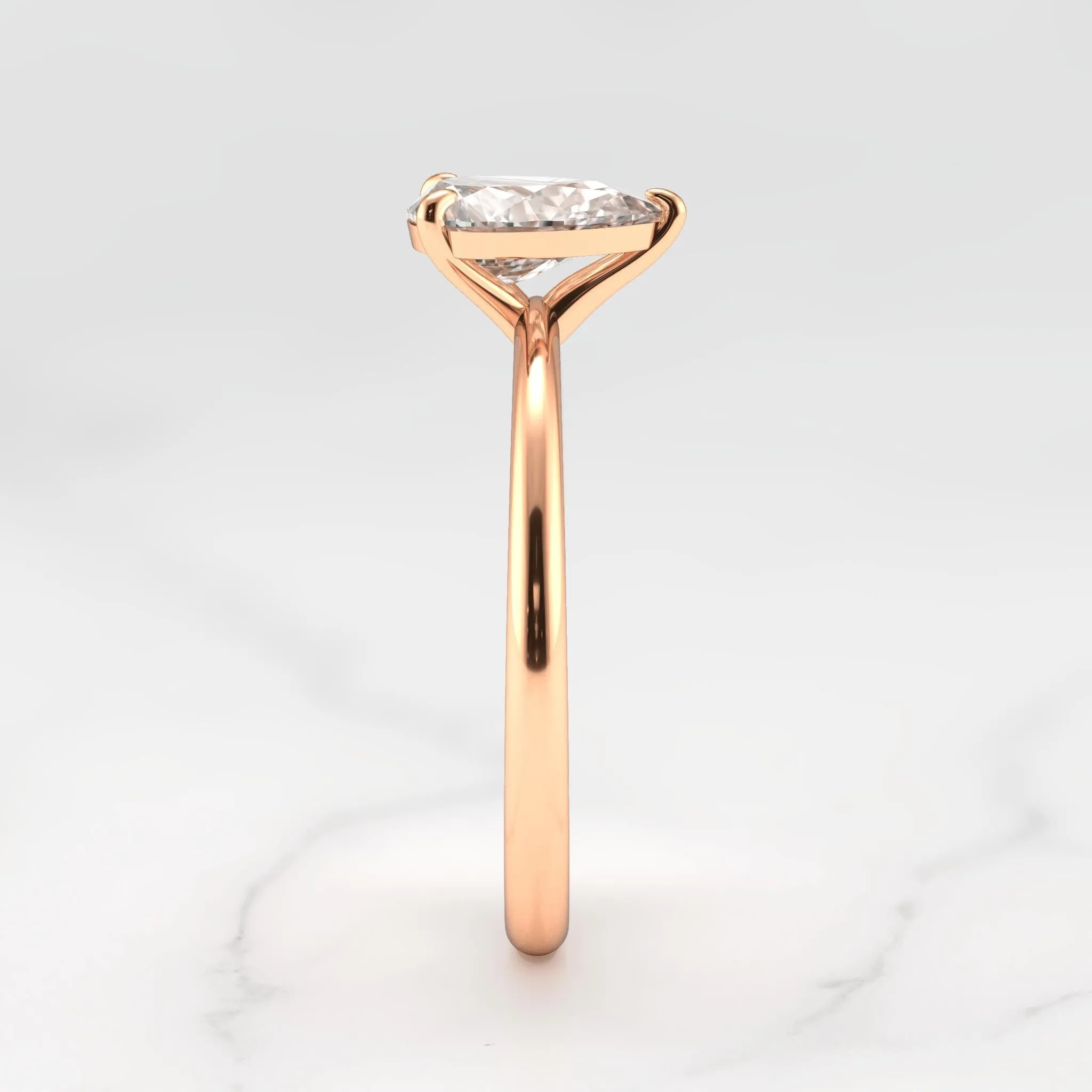 Pear Tapered Solitaire Diamond Ring