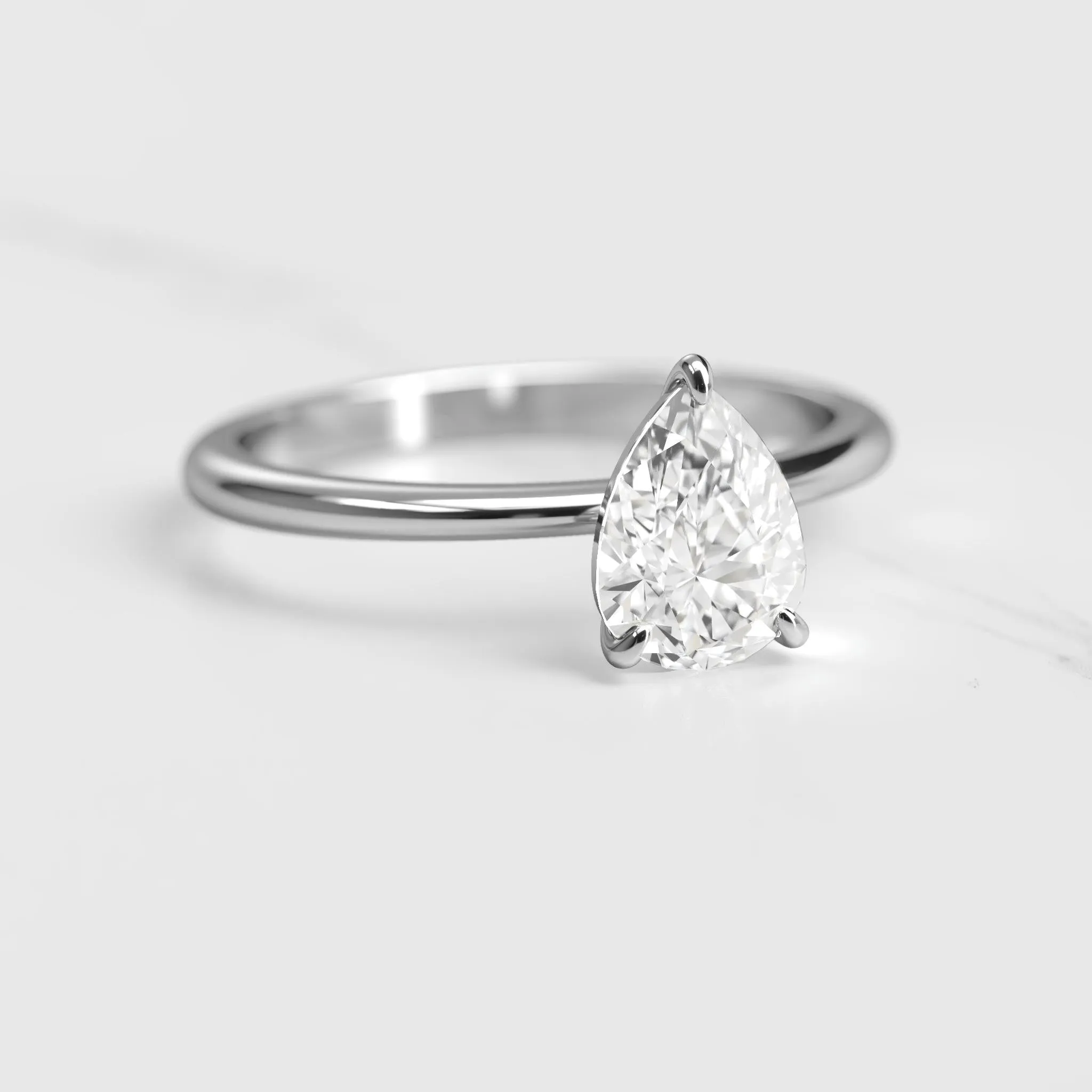 Pear Tapered Solitaire Diamond Ring