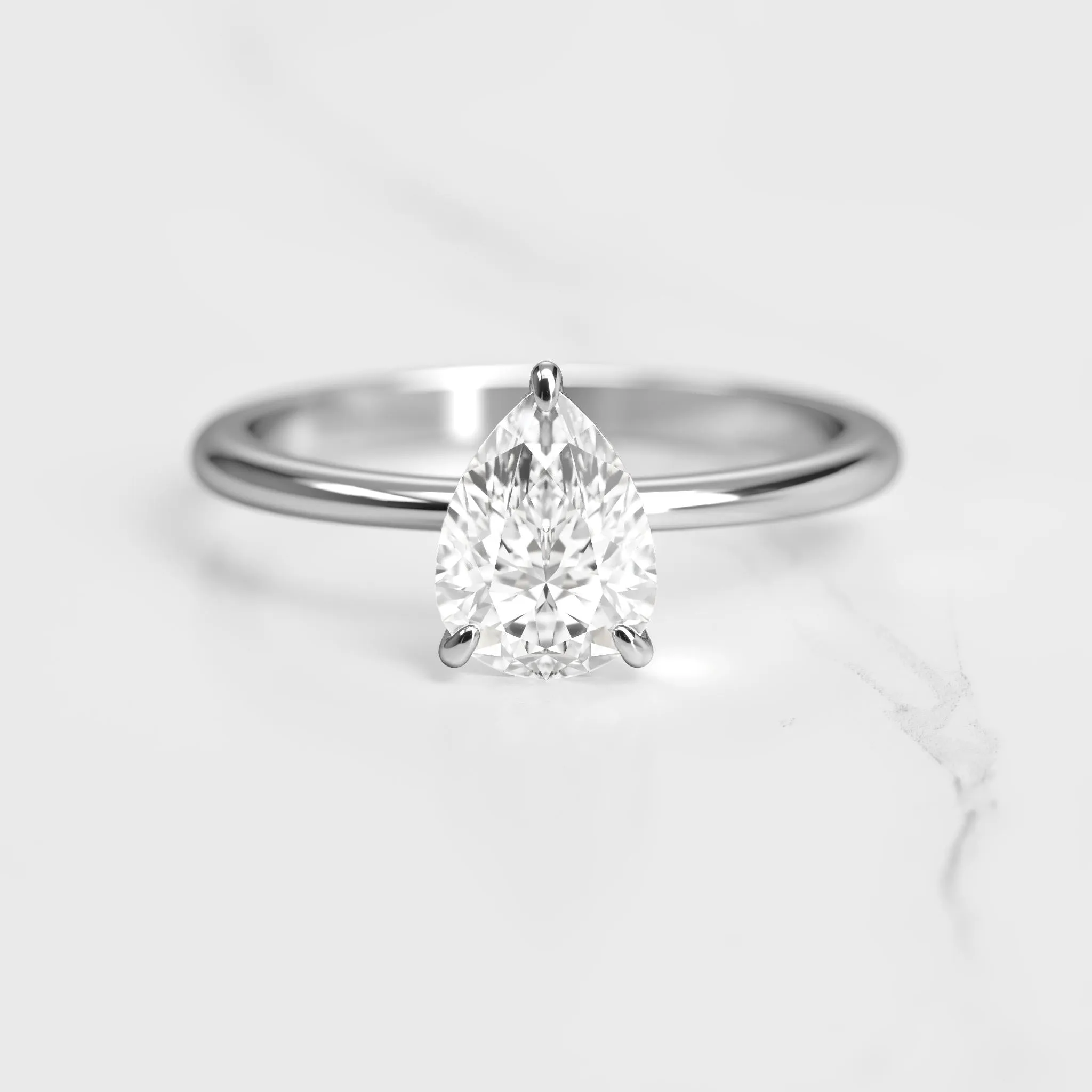 Pear Tapered Solitaire Diamond Ring