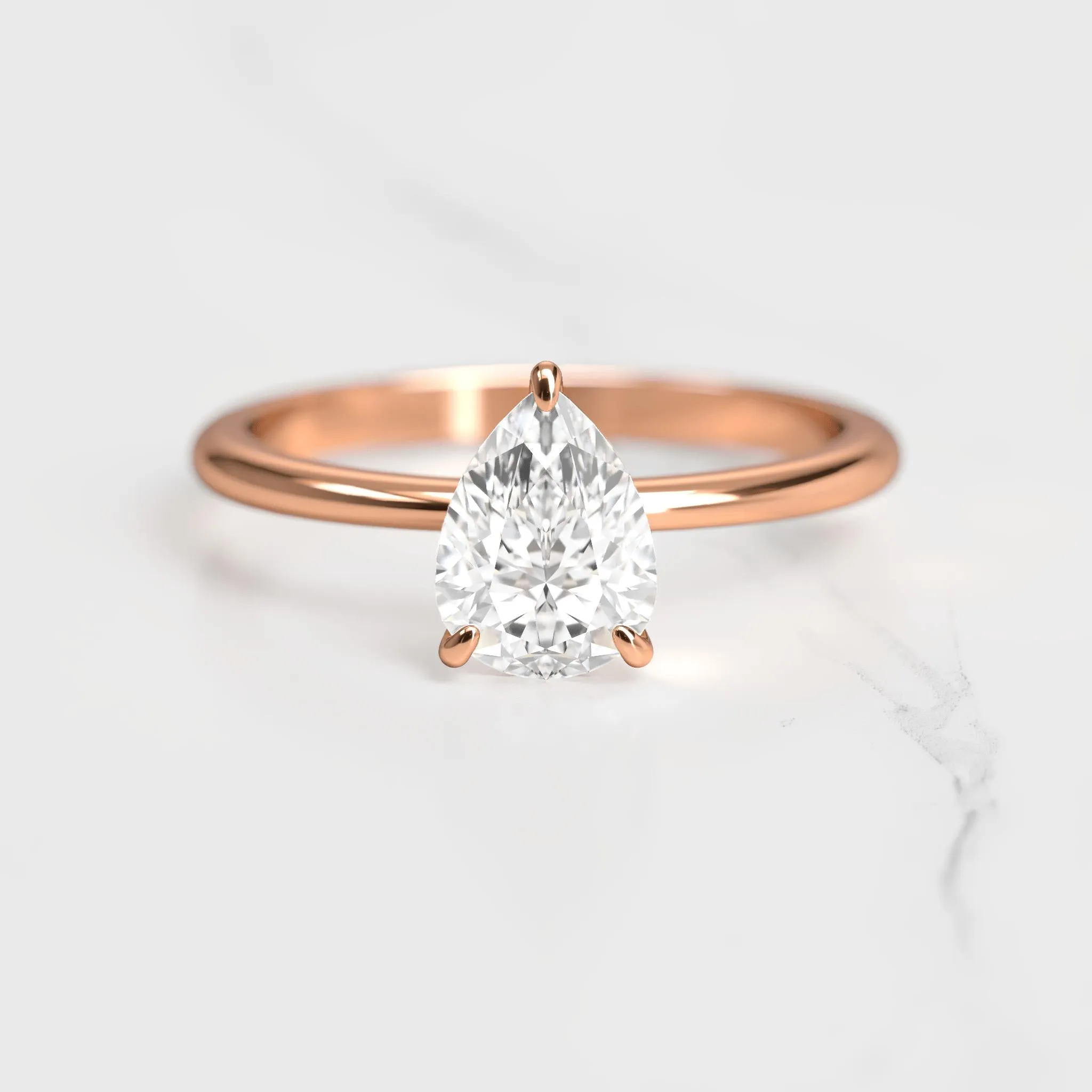 Pear Tapered Solitaire Diamond Ring