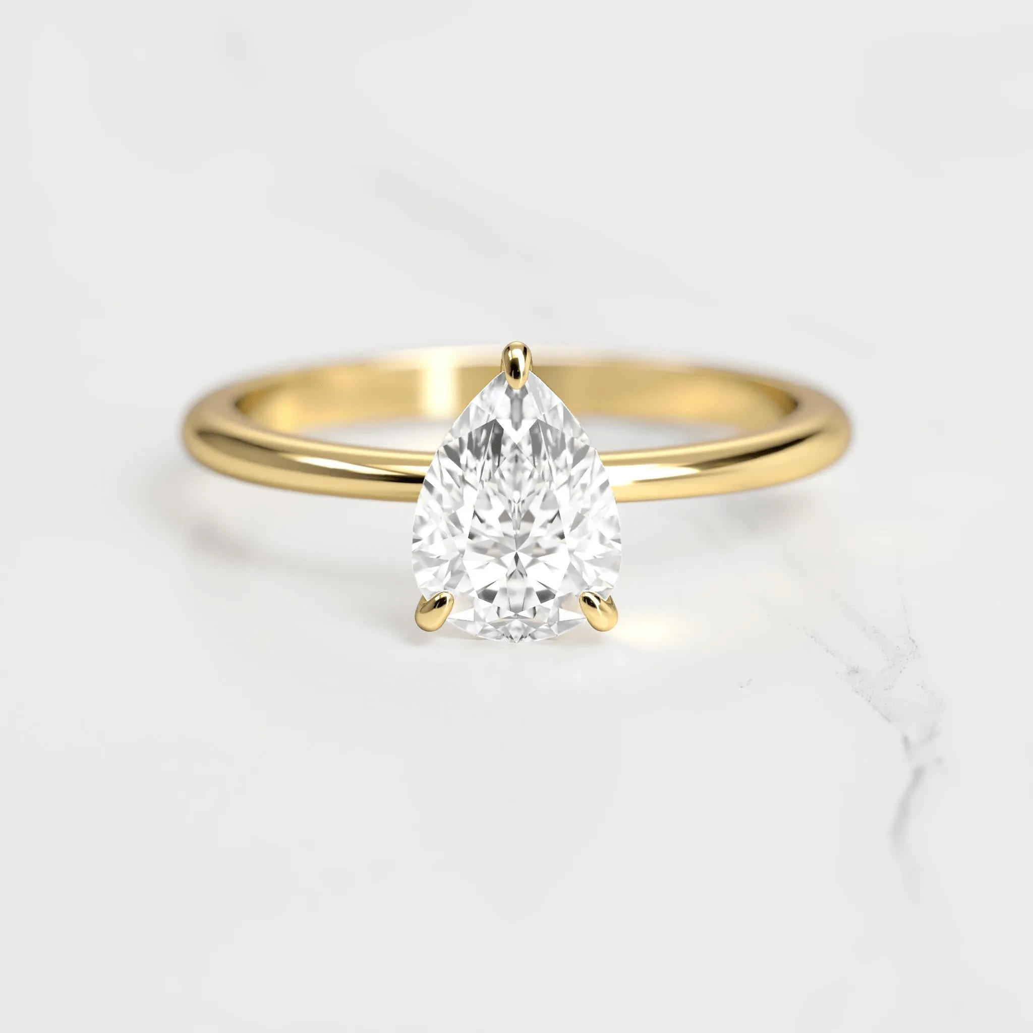 Pear Tapered Solitaire Diamond Ring